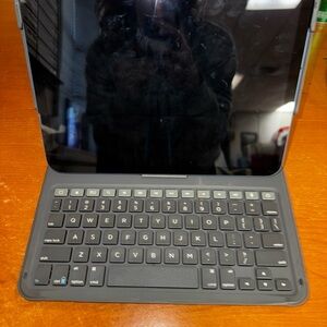 Apple Tablet with Black Keyboard Case and Stand